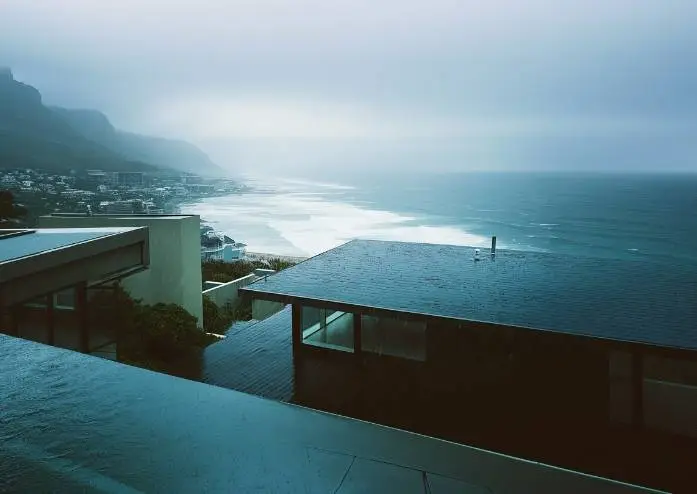 Durable waterproof roof paint protecting a Cape Town home against heavy rain and coastal winds.