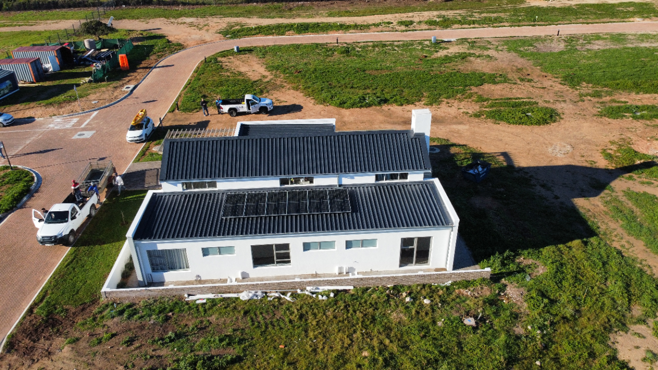 Durable waterproofing paint applied to a Cape Town home rooftop to prevent leaks in the coastal climate.