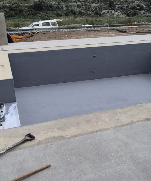 Weatherbond Enhance mixed with cement used to improve tile adhesion on waterproofed pool surfaces.