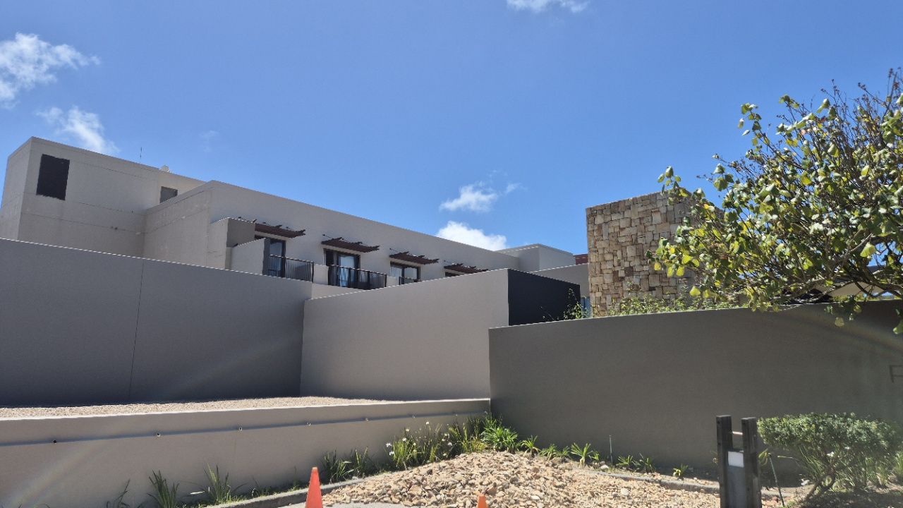 Wood doors and trims receiving Weatherprufe Woodseal protective coating at Oubaai Golf Estate Hotel.