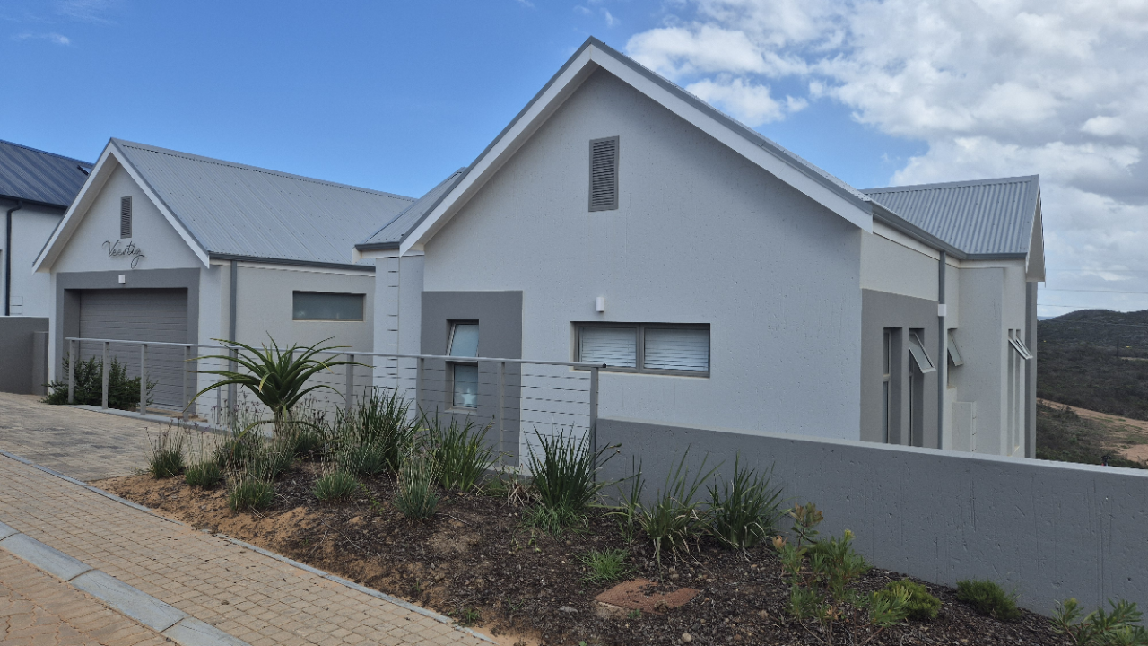 Completed Weatherseal protected homes at Outeniquasbosch Mossel Bay showcasing durable waterproofed exterior finishes